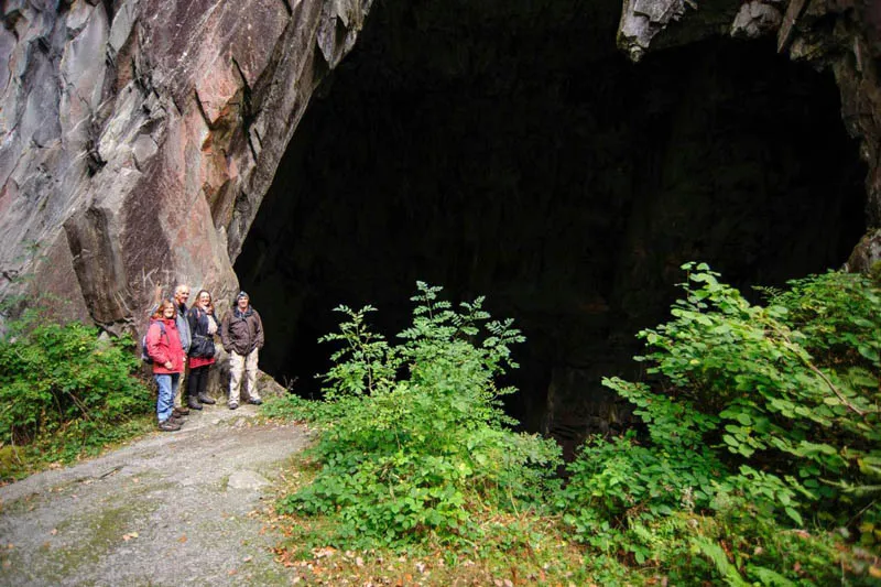 image of people standing at the entrance to Cathedral Quarry