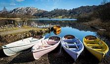 an image of boats at grasmere, the thirteenth largest of the lakes in the Lake District