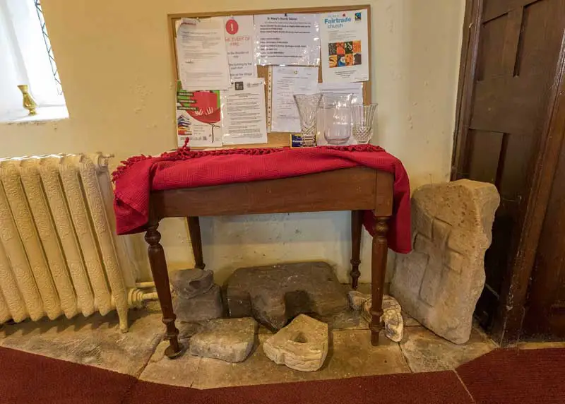 image of the remnants of a Viking cross in St Mary's church in Gilcrux in Cumbria