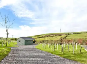 Cozy Lake District hot tub cottage surrounded by rolling countryside near Ulverston