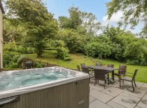 Charming former farmhouse with elevated patio hot tub and countryside views near Ulverston