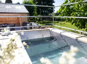 Historic farm cottage with open hot tub, garden bar, and BBQ area in Cartmel, Lake District