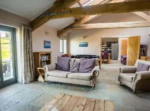 Living room in converted barn, Brockram Barn near Kirkby Stephen