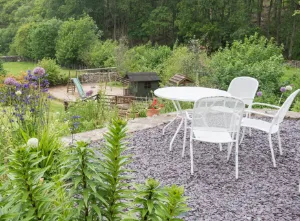 Outside seating and a play area at Mite Villa family friendly cottage in the Lake District at Eskdale