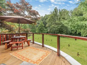 Image of a field from a raised decking area at a wheelchair friendly holiday cottage in the Lake District
