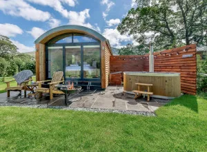 Rustic wood-fired hot tub with scenic views of Blencathra in the Lake District