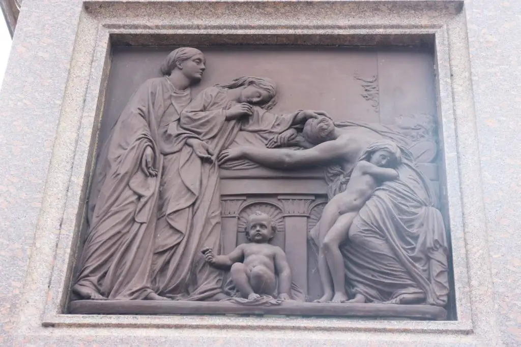 image of one of the bronze reliefs on Wigton Memorial Fountain